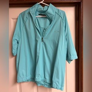 Greg Norman short sleeve pullover. Performance golf gear